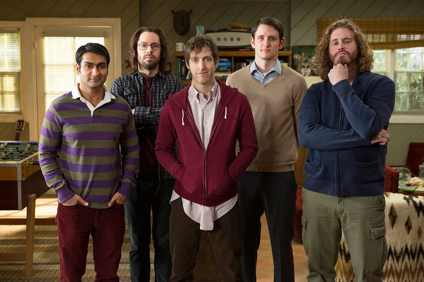 The main characters from Silicon Valley standing together in their shared startup house.